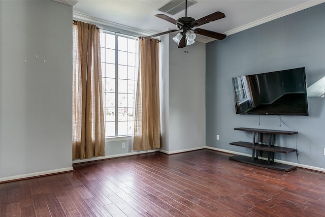 unfurnished living room with baseboards, visible vents, a ceiling fan, wood finished floors, and crown molding