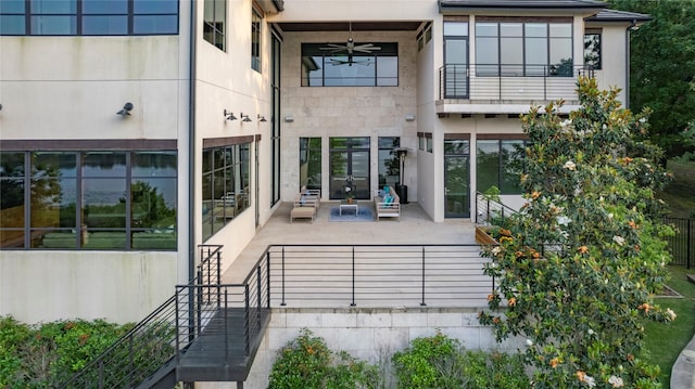 back of house with a patio area