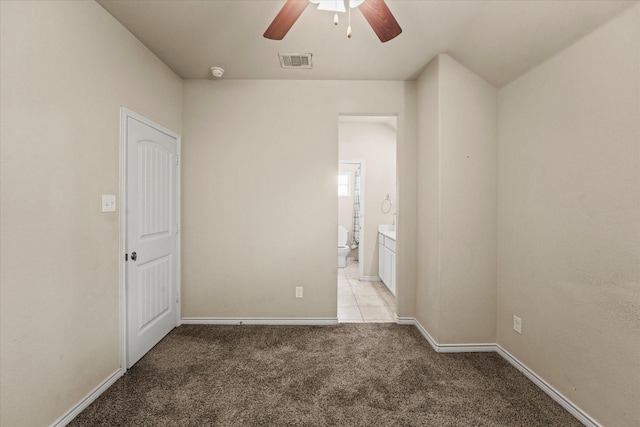 carpeted empty room with ceiling fan