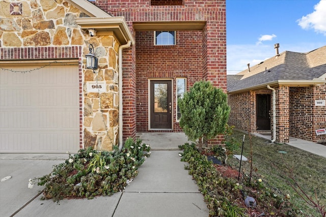 property entrance with a garage