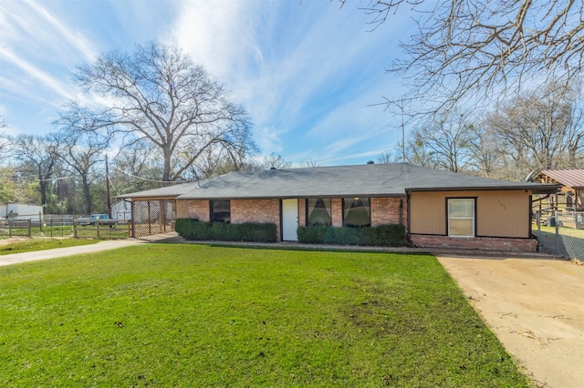 ranch-style house with a front yard