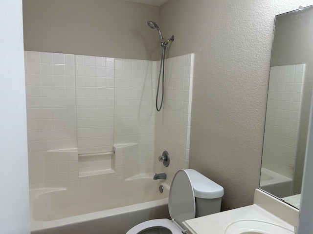 full bathroom featuring toilet, tub / shower combination, and vanity