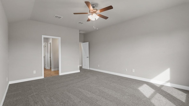 unfurnished bedroom with lofted ceiling, ceiling fan, and carpet