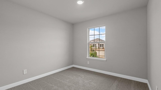 view of carpeted spare room