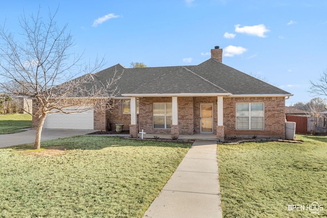 single story home featuring a front yard, a garage, and a porch