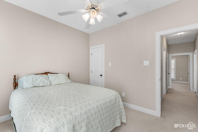 carpeted bedroom with ceiling fan