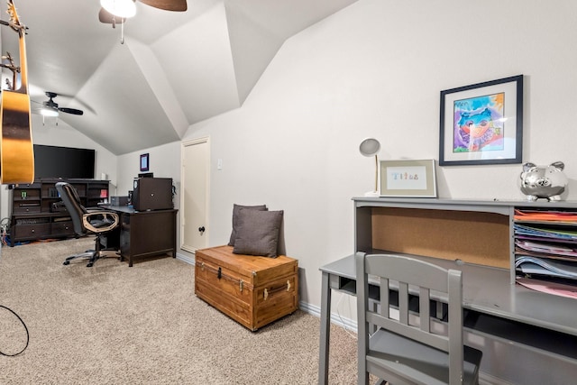 carpeted office space featuring lofted ceiling and ceiling fan