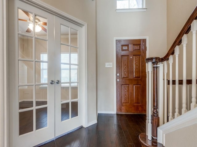 entrance foyer featuring french doors, dark hardwood / wood-style flooring, and ceiling fan