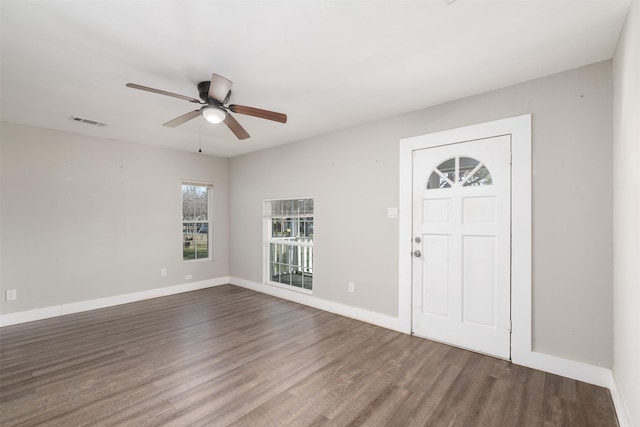 entrance foyer featuring ceiling fan and dark hardwood / wood-style flooring