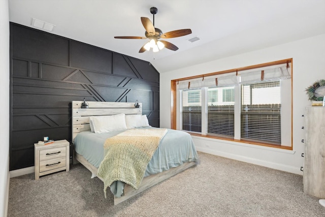 bedroom with carpet flooring, ceiling fan, and vaulted ceiling