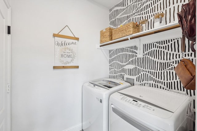 laundry room with separate washer and dryer