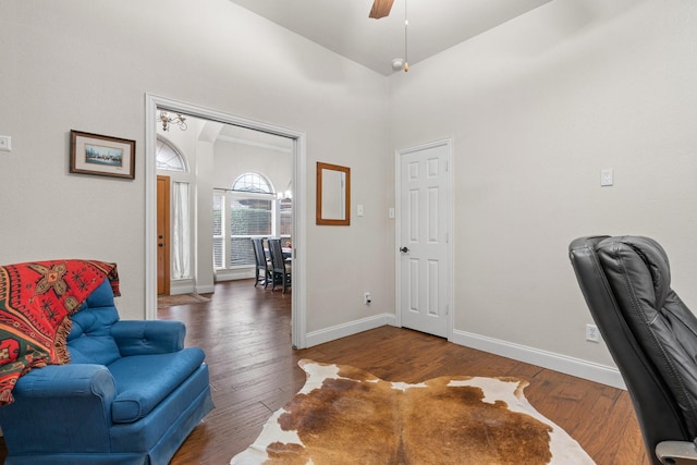 office with ceiling fan, dark hardwood / wood-style flooring, and high vaulted ceiling