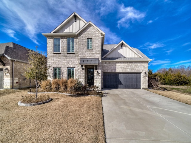 1056 Olympic Dr, Rockwall, TX 75087 - view of front of property featuring a front lawn and a garage
