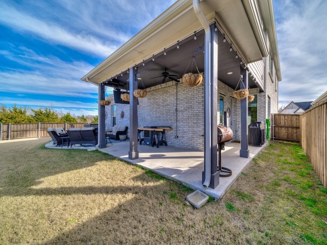 view of patio featuring ceiling fan and area for grilling