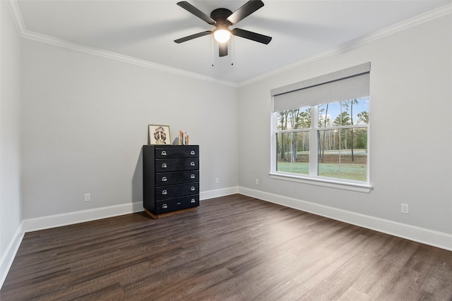 unfurnished bedroom with dark hardwood / wood-style flooring, ceiling fan, and crown molding