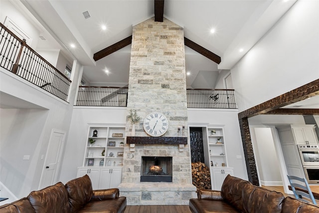 living room with a fireplace, high vaulted ceiling, beam ceiling, and wood-type flooring