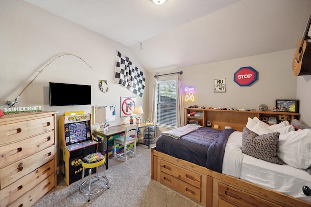 carpeted bedroom with vaulted ceiling