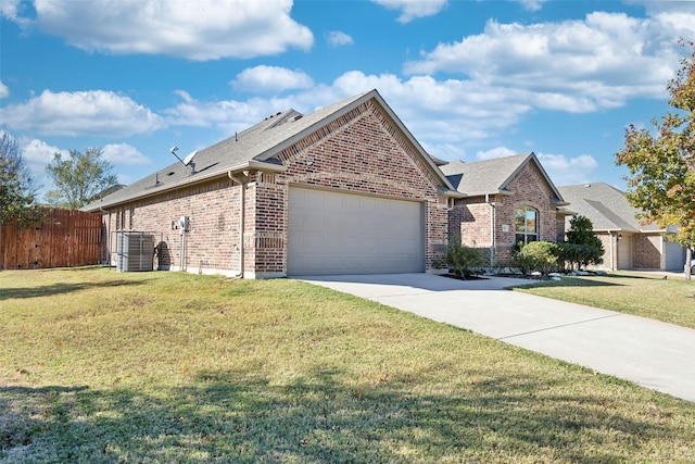 view of front facade with central air condition unit, a front lawn, and a garage