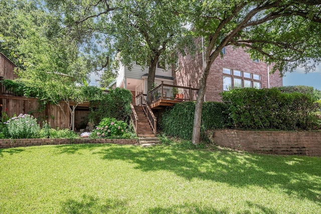 view of yard featuring a wooden deck