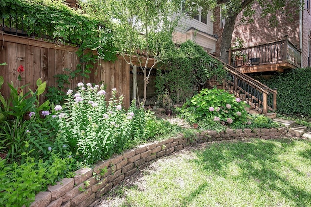 view of yard featuring a wooden deck