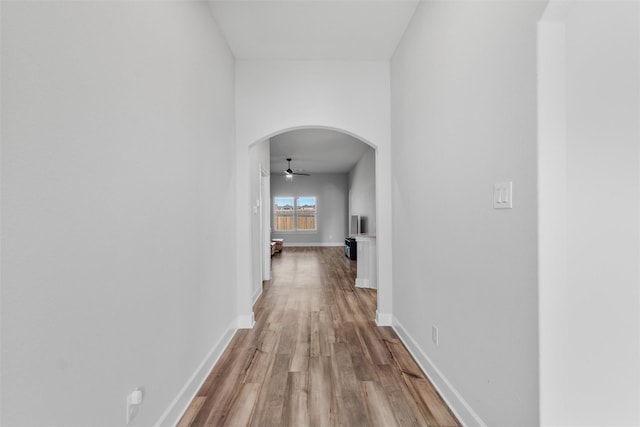 corridor featuring light hardwood / wood-style flooring