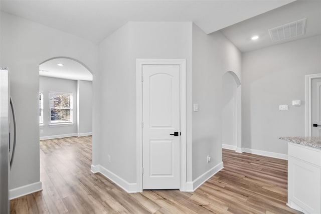 hallway featuring light hardwood / wood-style floors