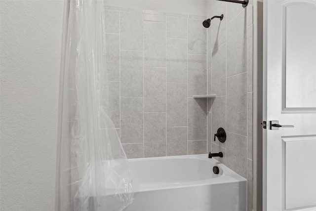 bathroom featuring shower / bath combo with shower curtain