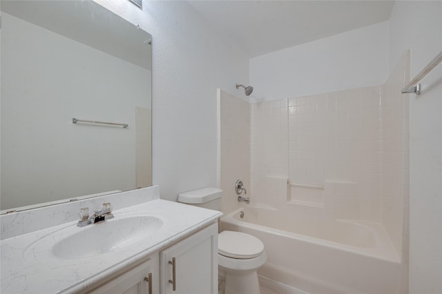 full bathroom featuring toilet, bathing tub / shower combination, and vanity