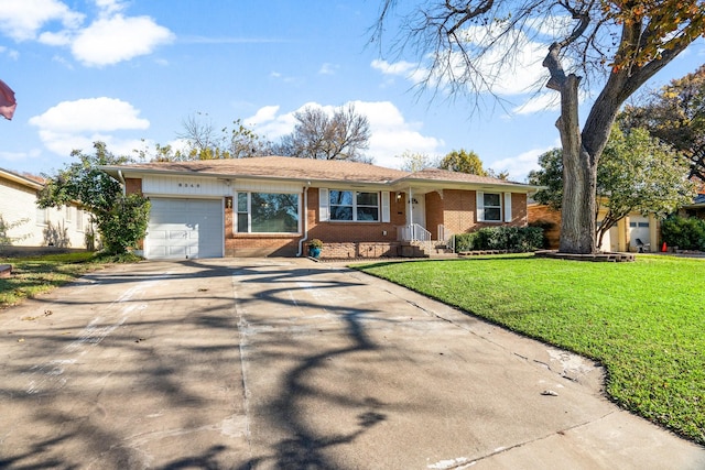 ranch-style house with a garage and a front yard