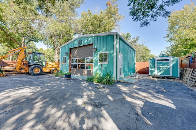 view of outbuilding with a garage