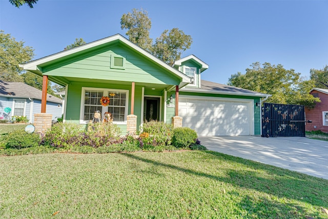 view of front facade featuring covered porch, a front lawn, and a garage