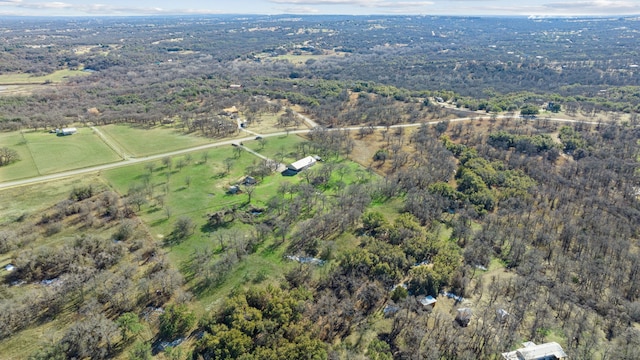 birds eye view of property featuring a rural view