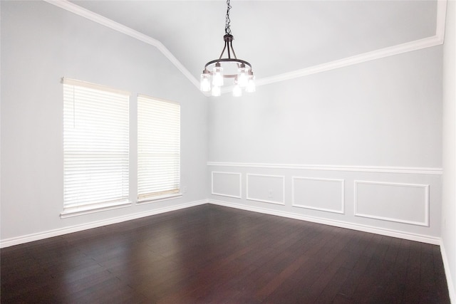 empty room with lofted ceiling, ornamental molding, a notable chandelier, and dark hardwood / wood-style floors