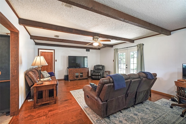 living room featuring a textured ceiling, french doors, beam ceiling, dark hardwood / wood-style flooring, and ceiling fan