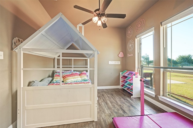 bedroom featuring ceiling fan and hardwood / wood-style flooring