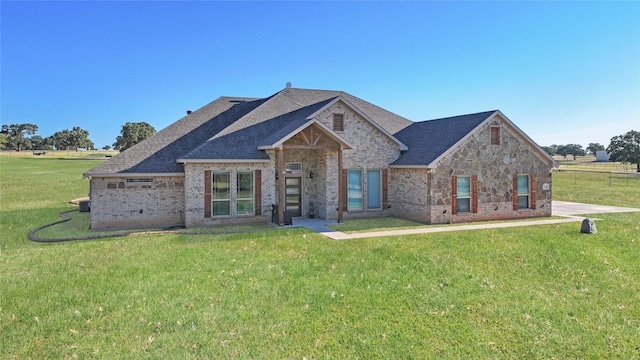 view of front of home with a front lawn