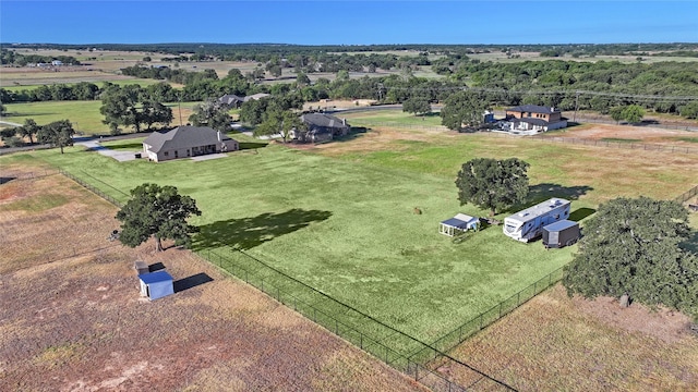 birds eye view of property featuring a rural view