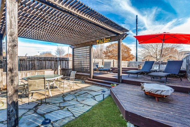 exterior space featuring a pergola and a deck