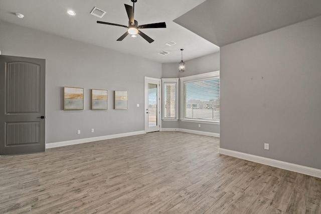 unfurnished room with light hardwood / wood-style flooring and ceiling fan