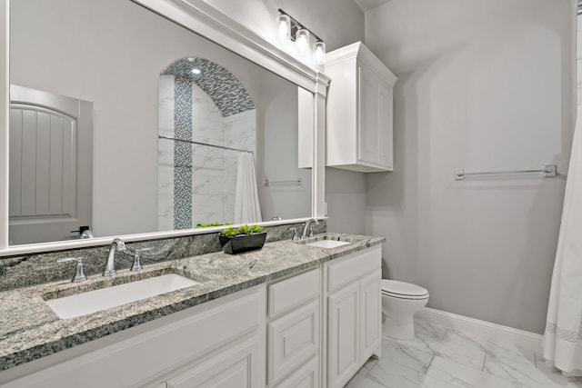 bathroom featuring vanity, toilet, and a shower with shower curtain