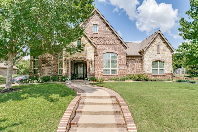 view of front of home with a front lawn