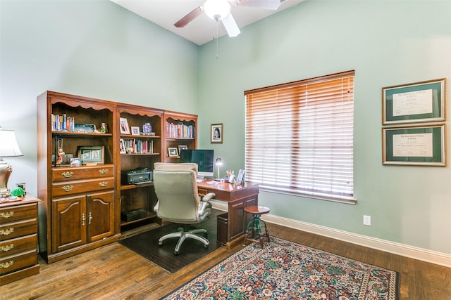 home office featuring ceiling fan and light hardwood / wood-style floors