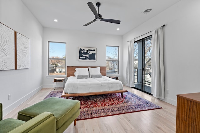 bedroom with ceiling fan, light wood-type flooring, and access to outside