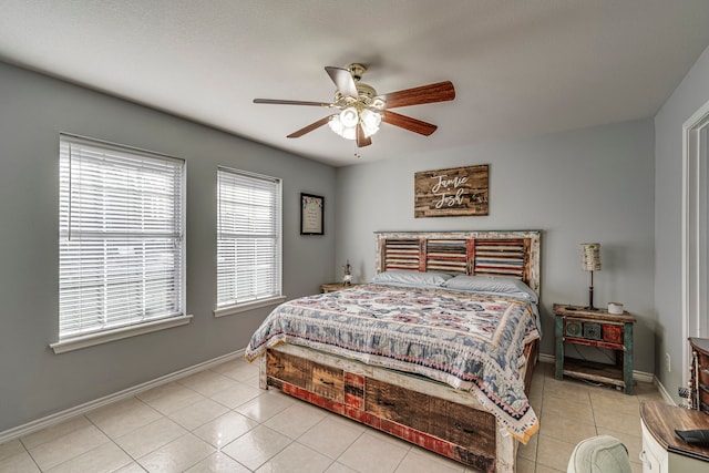 tiled bedroom with ceiling fan