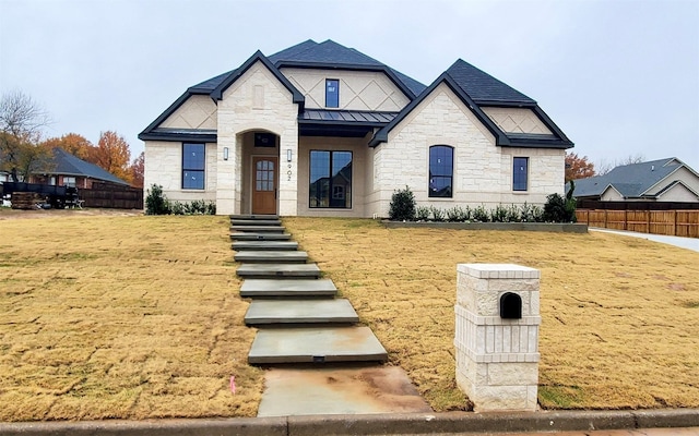 view of front of home with a front yard