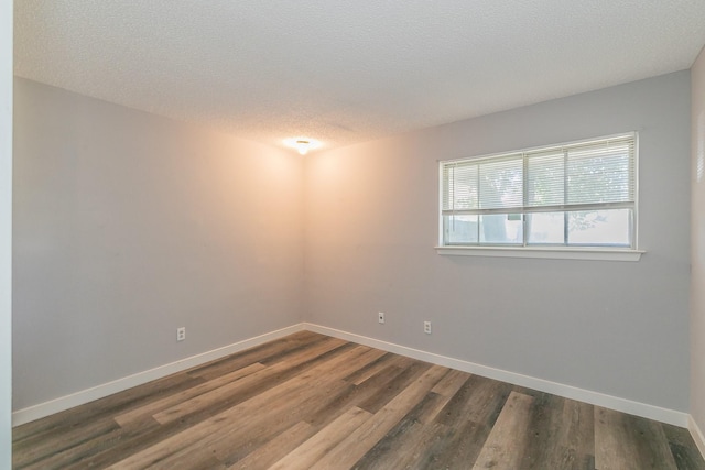 2005 Winewood Ln, Arlington, TX 76013 - unfurnished room featuring ceiling fan, carpet, a textured ceiling, and baseboards