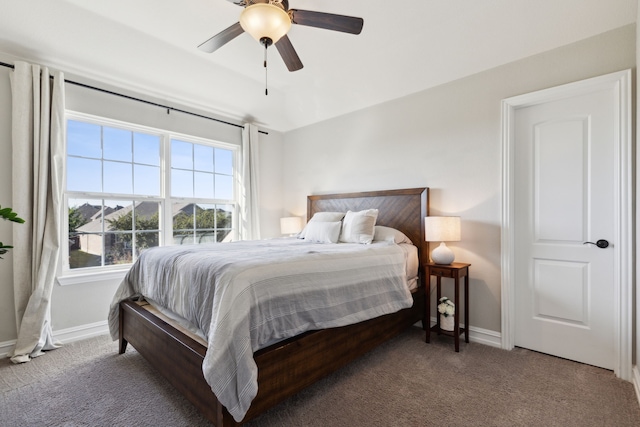 bedroom with ceiling fan and carpet flooring