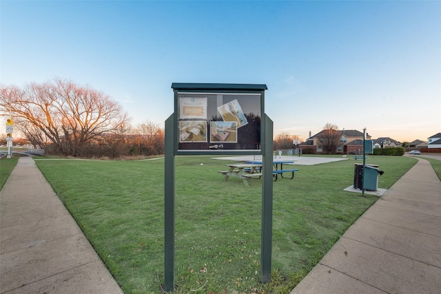 view of community featuring a lawn