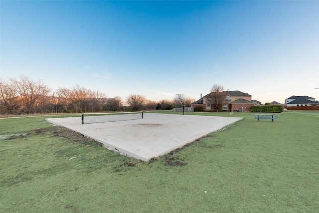 surrounding community featuring volleyball court and a yard