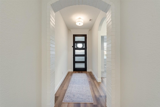 doorway featuring hardwood / wood-style floors